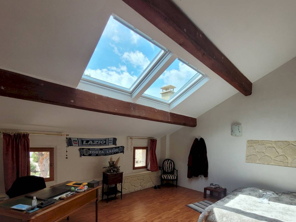 Installation d'une combinaison de fenêtres de toit