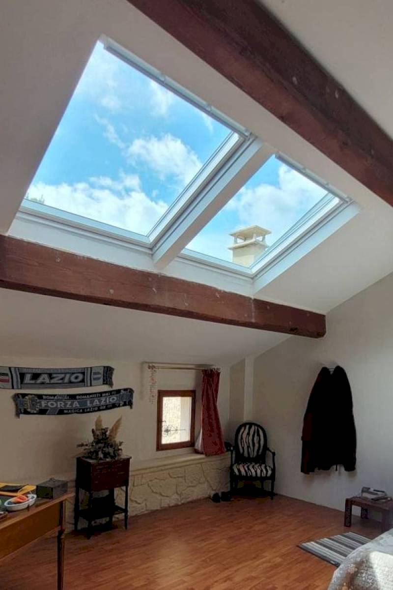 Installation d'une combinaison de fenêtres de toit