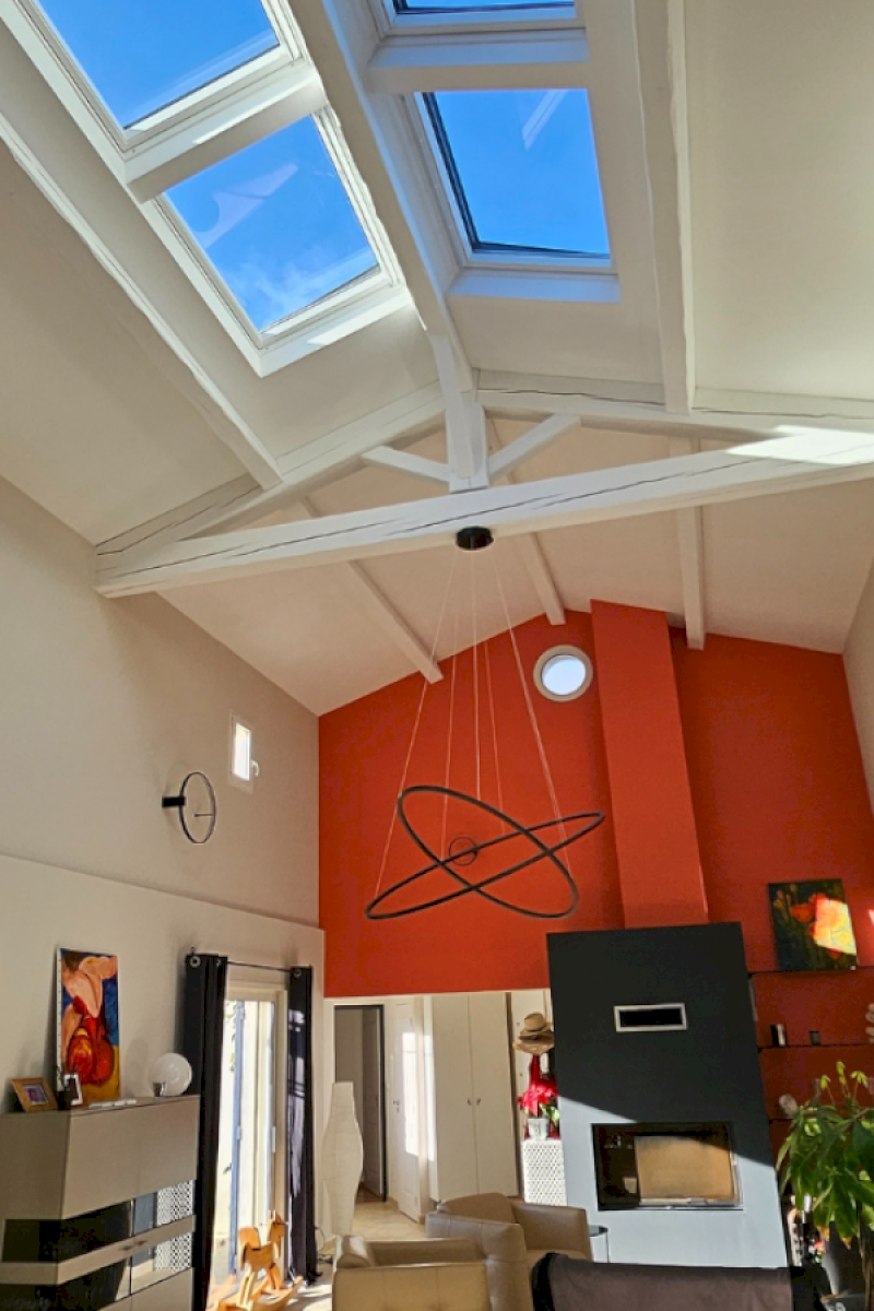 Installation de deux combinaisons de fenêtres de toit